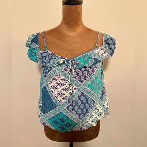 Forever 21 Juniors off the shoulder ruffle top, held up by small straps.